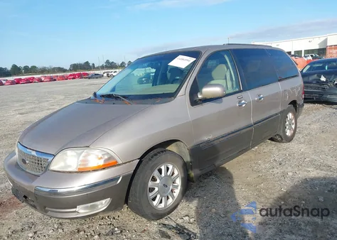 2001 Ford Windstar Limited z USA, uszkodzony, nr VIN 2FMDA584X1BB06423